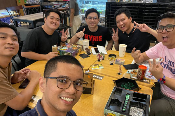 LevelUp teammates bonding around a table